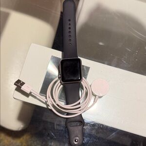 Black Apple Watch 3 with Charger